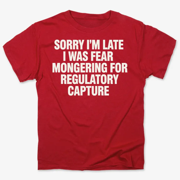 SORRY I’M LATE, I WAS FEAR MONGERING FOR REGULATORY CAPTURE-Men's T-Shirt-Red