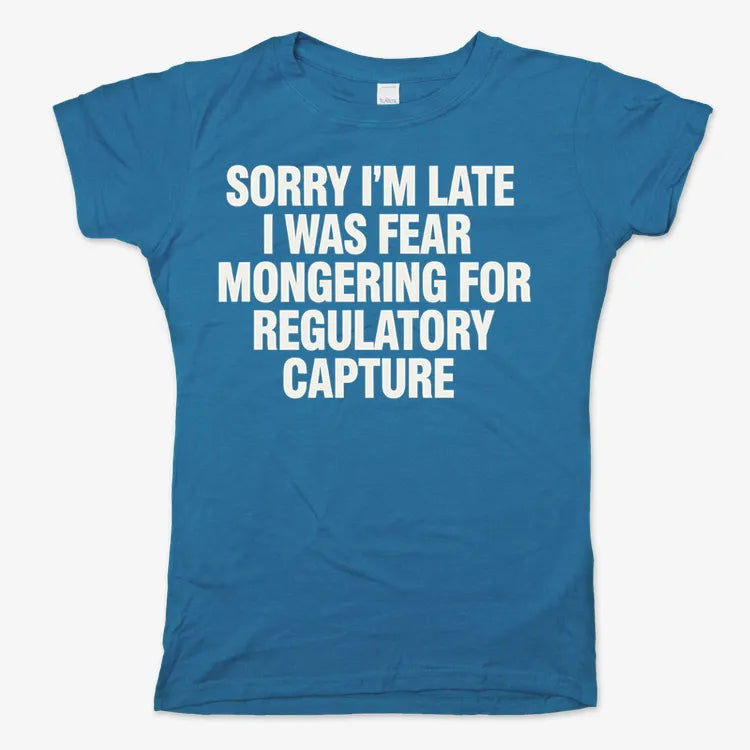SORRY I’M LATE, I WAS FEAR MONGERING FOR REGULATORY CAPTURE-Women's T-Shirt-Sky Blue