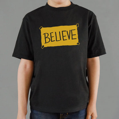 Believe Taped Yellow Paper Sign