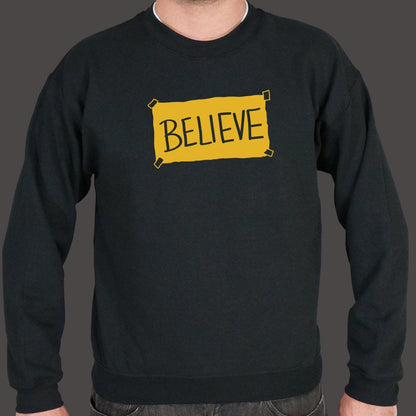 Believe Taped Yellow Paper Sign