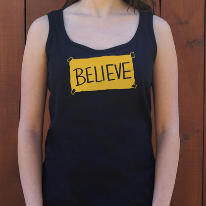 Believe Taped Yellow Paper Sign