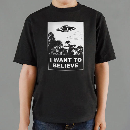 I Want To Believe UFO Flying Over Forest graphic Kids T-Shirt in Black